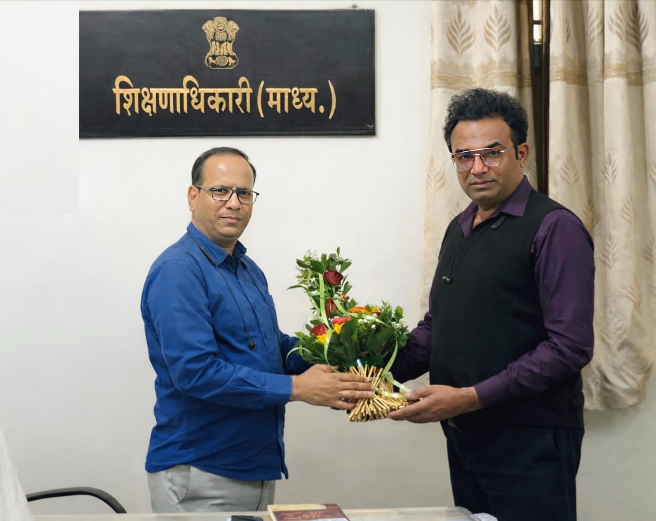 Swapnil G. meeting a secondary education officer