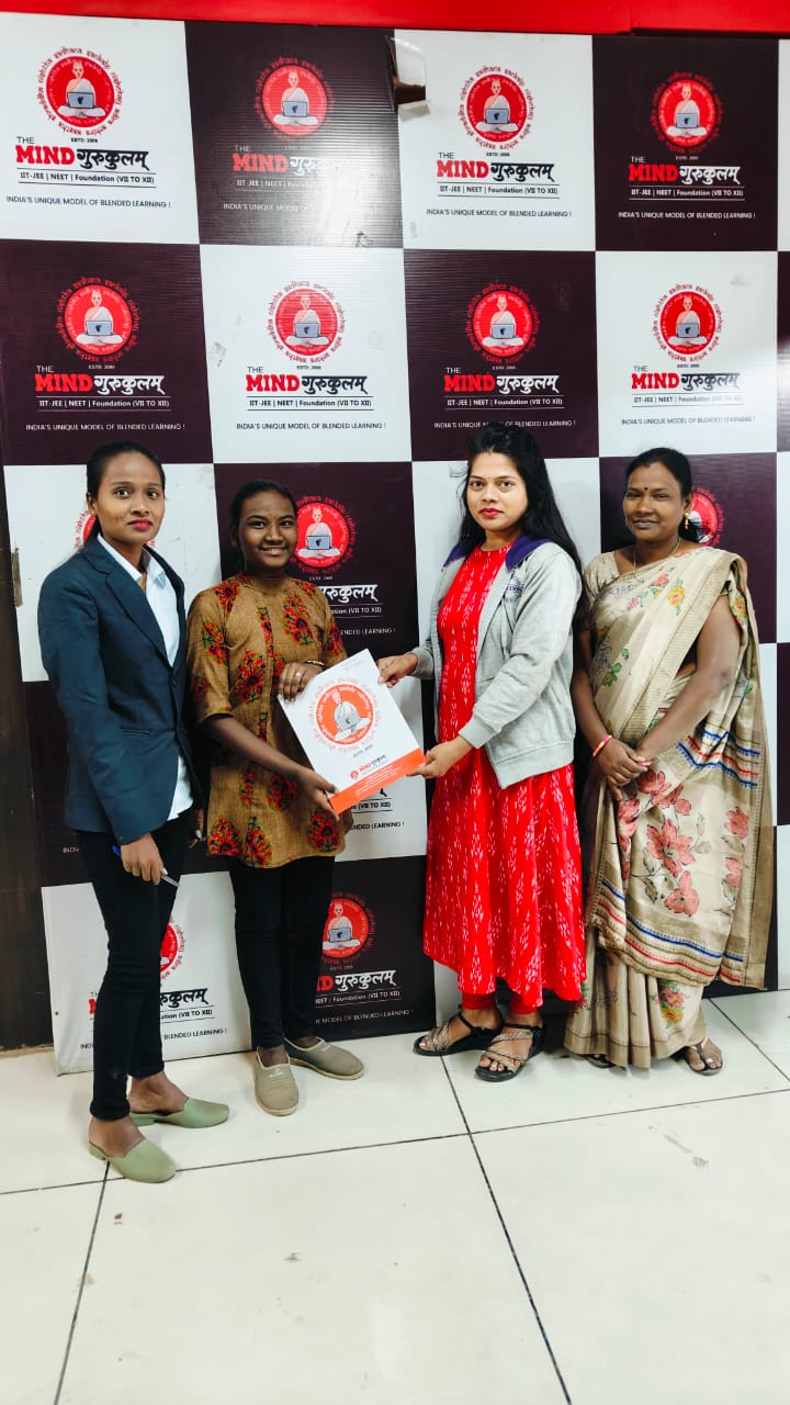 Mind Gurukulam staff meeting a student and her mother