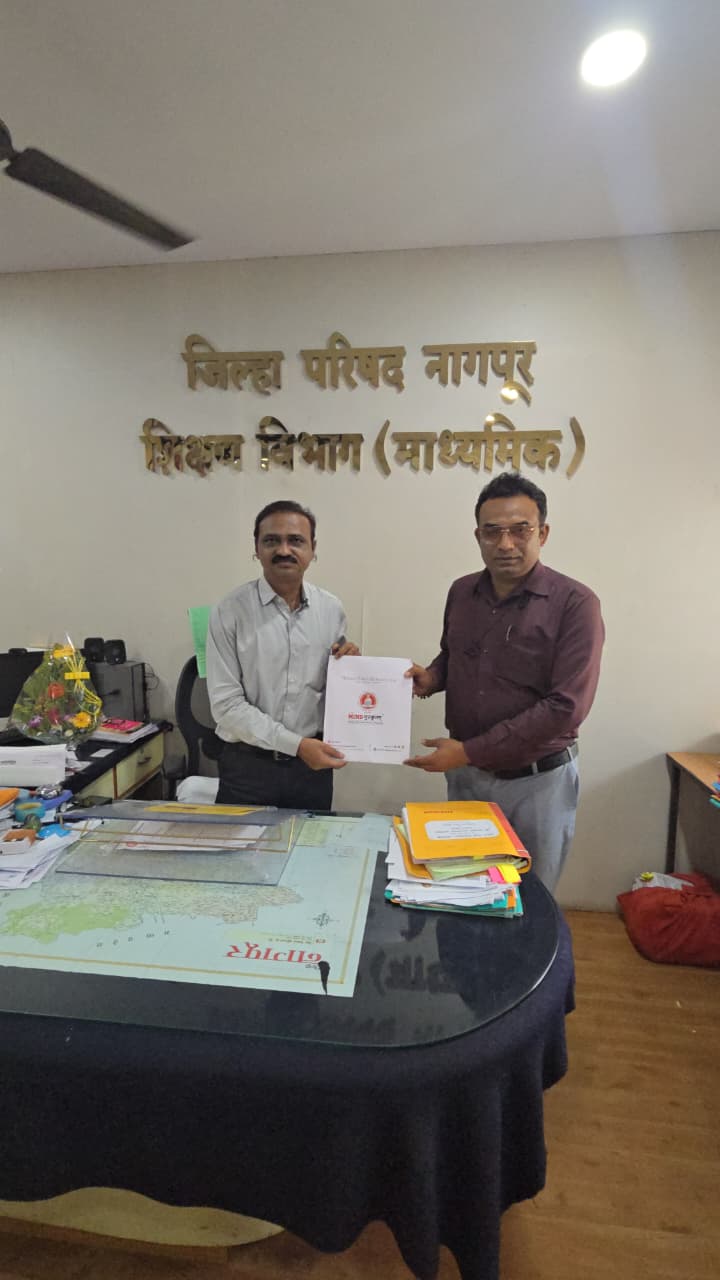 Swapnil G. meeting an education official at the Pune secondary education office