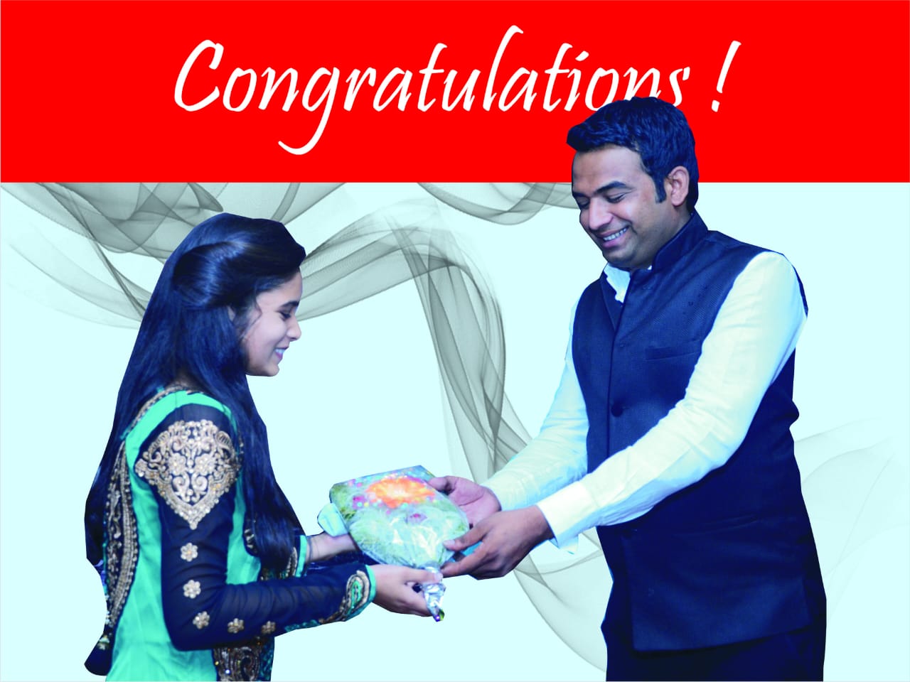 Mentor congratulating a student at a Mind Gurukulam event